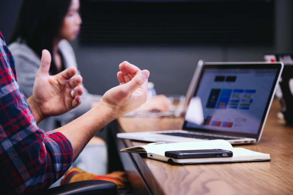 Hands of a person discussing in a meeting 