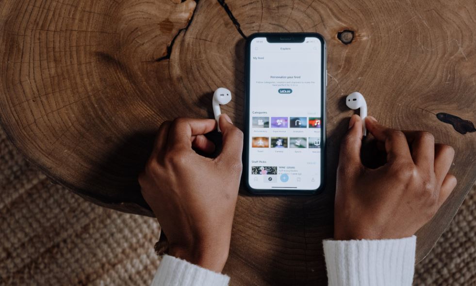 person-holding-silver-iphone-6