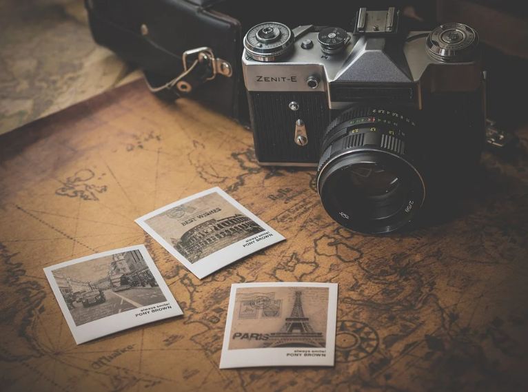 a free stock photo a camera and map from pixabay